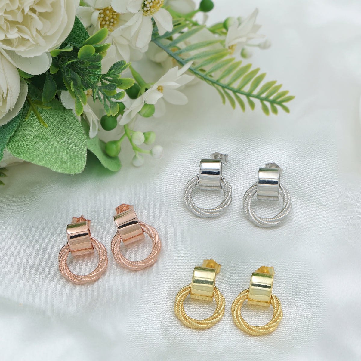 TWISTED HOOP EARRINGS